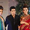 Models with designer Manish Malhotra walk on ramp at Aamby Valley Indian Bridal Week day 5