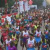 Participants during the Delhi Half Marathon, in New Delhi on Sunday