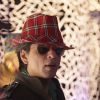 Shahrukh looking wonderful in red hat | Billu Barber Photo Gallery