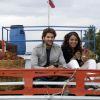 Neil and Bipasha sitting on a truck