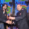Growel Group Chairman Mr. Umesh More awarding the winner of Growel Idol
