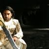 Abhishek Bachchan : Abhishek sitting with sword