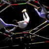 Kolkata: Circus performers perform skills during the trapeze round in Olympic Circus held in Kolkata in the eve of up coming New Year 2011, on Friday. .