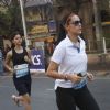 Neha Dhupia taking part in Standard Chartered Mumbai Marathon 2011