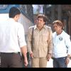 Rajpal Yadav : Rajpal Yadav and Govinda talking to someone
