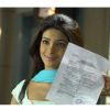 Priyanka Chopra with a confirmation letter