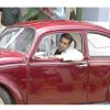 Salman Khan : Salman Khan sitting on a car