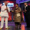 Pankaj and Supriya Pathak presenting Gulzar for Best Lyrics at the 56th Idea Filmfare Awards 2010. .
