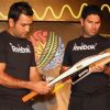 Cricketers M S Dhoni and Yuvraj Singh at a promotional event in New Delhi on Wed 2 Feb 2011. .
