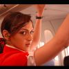 Esha Deol : Esha Deol standing on a aeroplane