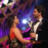 Rani Mukherjee giving trophy to Hrithik Roshan at Stardust Awards-2011