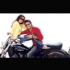 Kumar Saahil and Sneha Ullal sitting on a bike