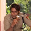 Ajay Devgan eating a icecream