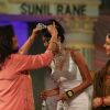 Zeenat Aman putting the crown to a winner at Grand Finale of Indian Princess 2011-12