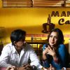 Hrishita and Subhashish sitting in a coffee house | Aasma Photo Gallery