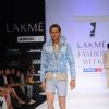 A model displays designer Sanjay Hingu's creations during the Lakme Fashion Week day 4 in Mumbai. .