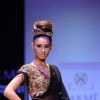 A model displays designer Priya Puri's creations during the Lakme Fashion Week day 4 in Mumbai. .