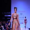 A model displays designer Priya Puri's creations during the Lakme Fashion Week day 4 in Mumbai. .