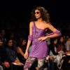 A model displays designer Rocky S's creations during the Lakme Fashion Week day 4 in Mumbai. .
