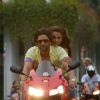 Arshad Warsi : Arshad Warsi and Amrita Arora sitting on a bike