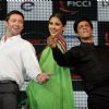 Hugh Jackman, Vidya Balan and Shah Rukh Khan at FICCI Frames Excellence Honours 2011