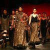 Models showcasing designer Sabyasachi's creations at the Wills Lifestyle India Fashion Week's Grand Finale ,in New Delhi on Sunday. .