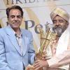 Actor Dharmendra launches Ali Peter's book on his 60th Birthday at PL Deshpande Hall. .