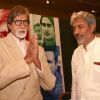 Film 'Aarakshan' director Prakash Jha with Amitabh Bachchan at a promotional event for his film