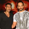 Ajay Devgan and Rohit Shetty at press meet to promote their film "Singham", in New Delhi