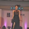 Model walks the ramp for IIID Copper Fashion Show 2011