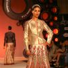 Model showcasing designer J J Valaya's creation at the Synergy one Delhi Couture Week,in New Delhi