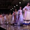 Models showcasing designer Manish Malhotra's creations at Synergy1 Delhi Couture Week,in New Delhi