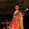 Model showcasing designer Manish Malhotra's creations at Synergy1 Delhi Couture Week,in New Delhi