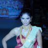 Model walks the ramp for Sangam Chains at IIJW 2011