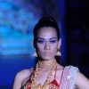 Model walks the ramp for Sangam Chains at IIJW 2011