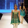 Model walks the ramp for Sangam Chains at IIJW 2011