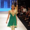 Model walks the ramp for Sangam Chains at IIJW 2011