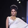 Model walks the ramp for Monica Kapur at IIJW 2011