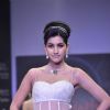 Model walks the ramp for Monica Kapur at IIJW 2011