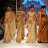 Models walks the ramp for vijay Golecha at IIJM 2011