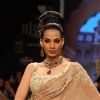 Models walks the ramp for Vijay Golecha at IIJM 2011