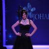 Zarine Khan walks the ramp for Johara at IIJM 2011