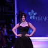 Zarine Khan walks the ramp for Johara at IIJM 2011