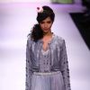 Model displays designer VJ Balhara's creation during the Lakme Fashion Week Day 3 in Mumbai. .