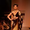 Model display creations by designers Bhumika and Shyamal during Lakme Fashion Week Day 3 in Mumbai. .