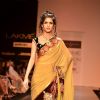 Model display creations by designers Bhumika and Shyamal during Lakme Fashion Week Day 3 in Mumbai. .
