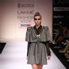Model display creations by designer Ruchika Sachdeva during Lakme Fashion Week Day 3 in Mumbai. .