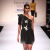 Model display creations by designer Ruchika Sachdeva during Lakme Fashion Week Day 3 in Mumbai. .