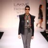 Model display creations by designer Ruchika Sachdeva during Lakme Fashion Week Day 3 in Mumbai. .