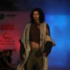 Model walks the ramp for WLC Chimera fashion show at Leela Hotel